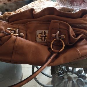 100 percent leather hand bag